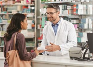 pharmacist assisting a customer