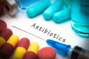 antibiotics capsules and pills on table