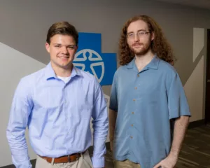 Arkansas Blue Cross interns Vincent Turturro and Adam Devine get to practice technical skills at their summer internship with the Blue.